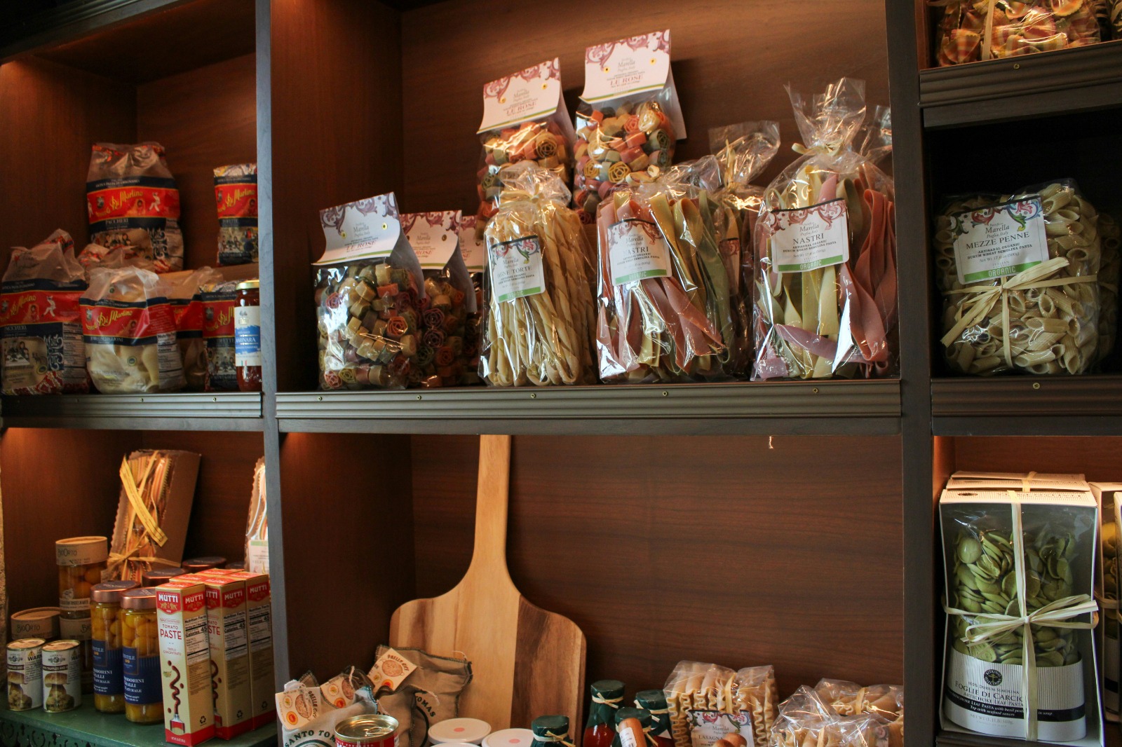 Italian artisan products on wooden shelves